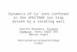 Dynamics of Ca +  ions confined in the SPECTRAP ion trap driven by a rotating wall