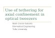Use of tethering for axial confinement in optical tweezers