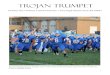 The 2013 football team runs through a tunnel of fans ......“Party Rock Anthem” by LMFAO and the “THS Fight Song.” When the Marching Trojans finished their route, they met former